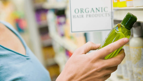 Women reviewing shampoo label