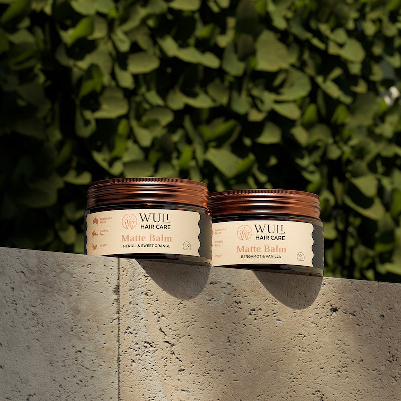 Wuli Hair Care Styled Matte Balm Jars on Stone bench and natural background